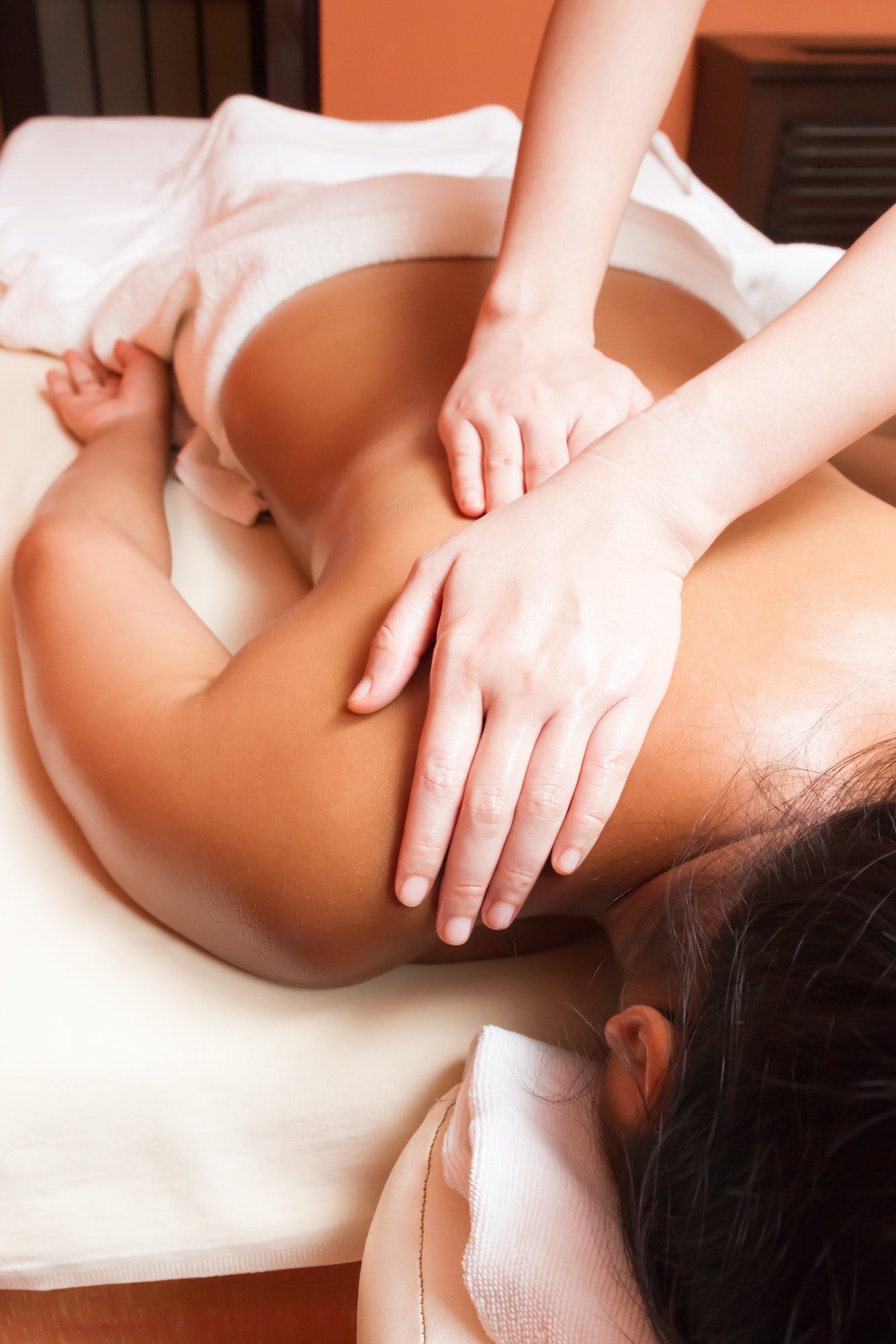 woman-getting-a-massage-at-a-health-and-beauty-spa